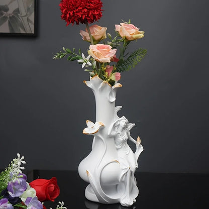 A Decorative Vase Featuring a Girl Sitting Sideways, Made of Resin with a Modern Design