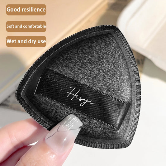 Black triangular makeup pad - Soft velvet cosmetic sponge for facial makeup. Beauty makeup sponge for applying foundation.